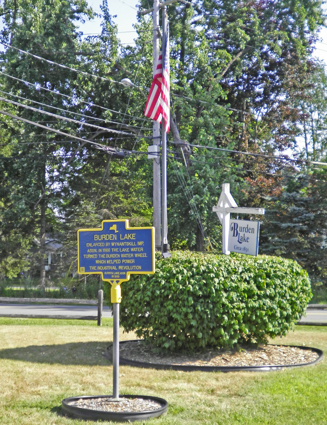 restored Burden Lake marker in place
