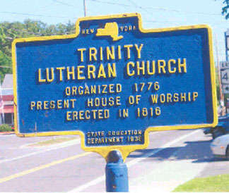 Historical marker for Trinity Lutheran Church in West Sand Lake.