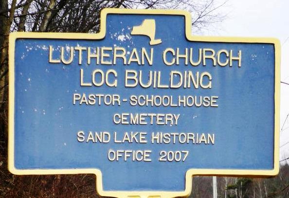 Log Church sign in 2022