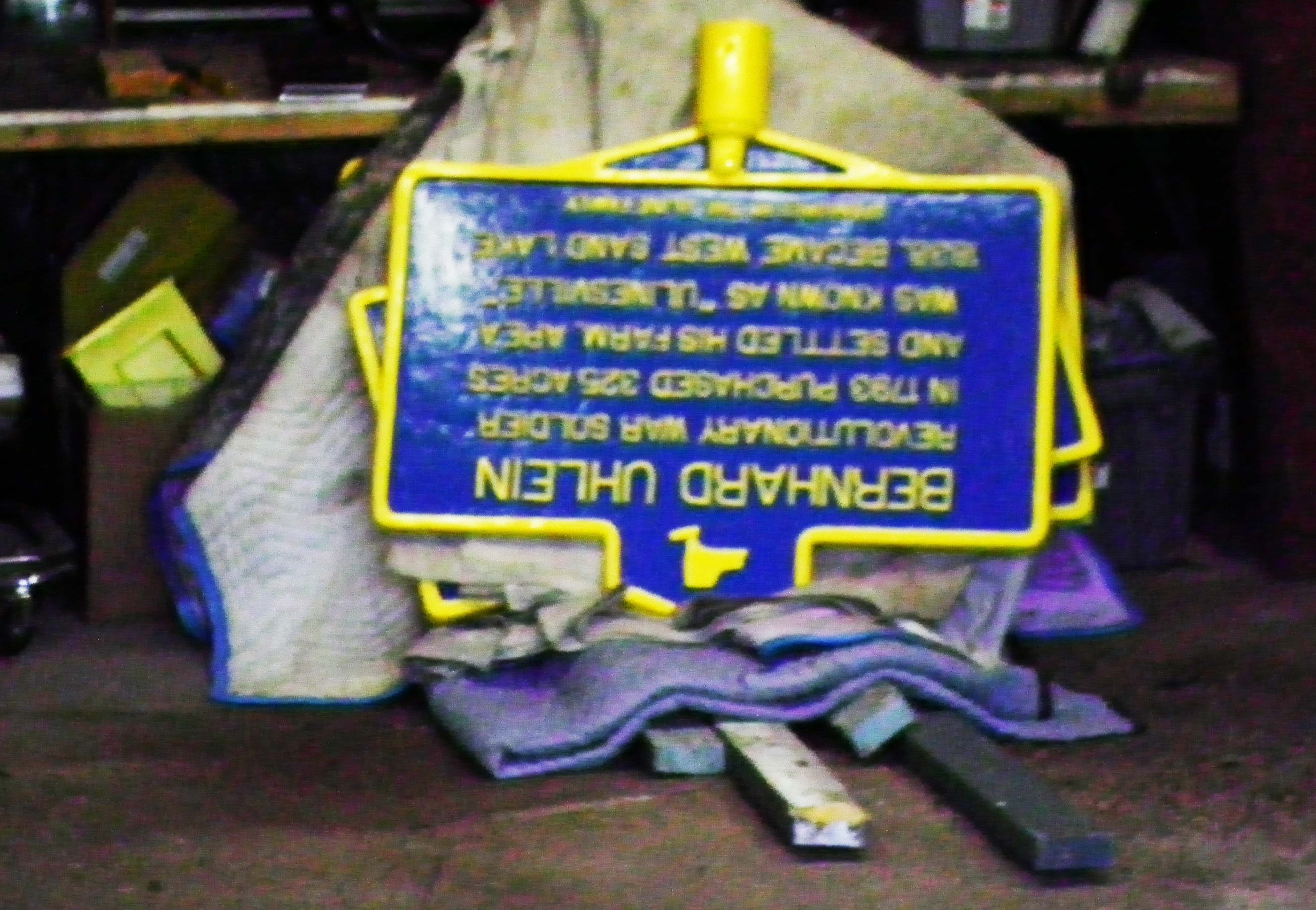 restored Uhlein marker with others in storage