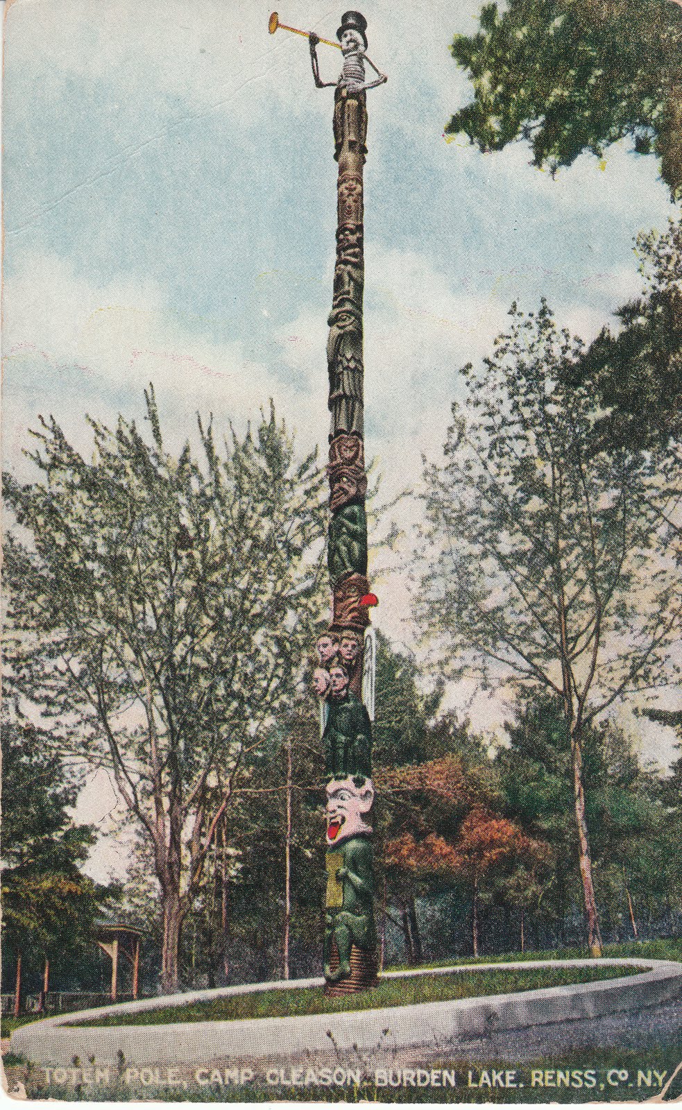hand colored post card of totem pole